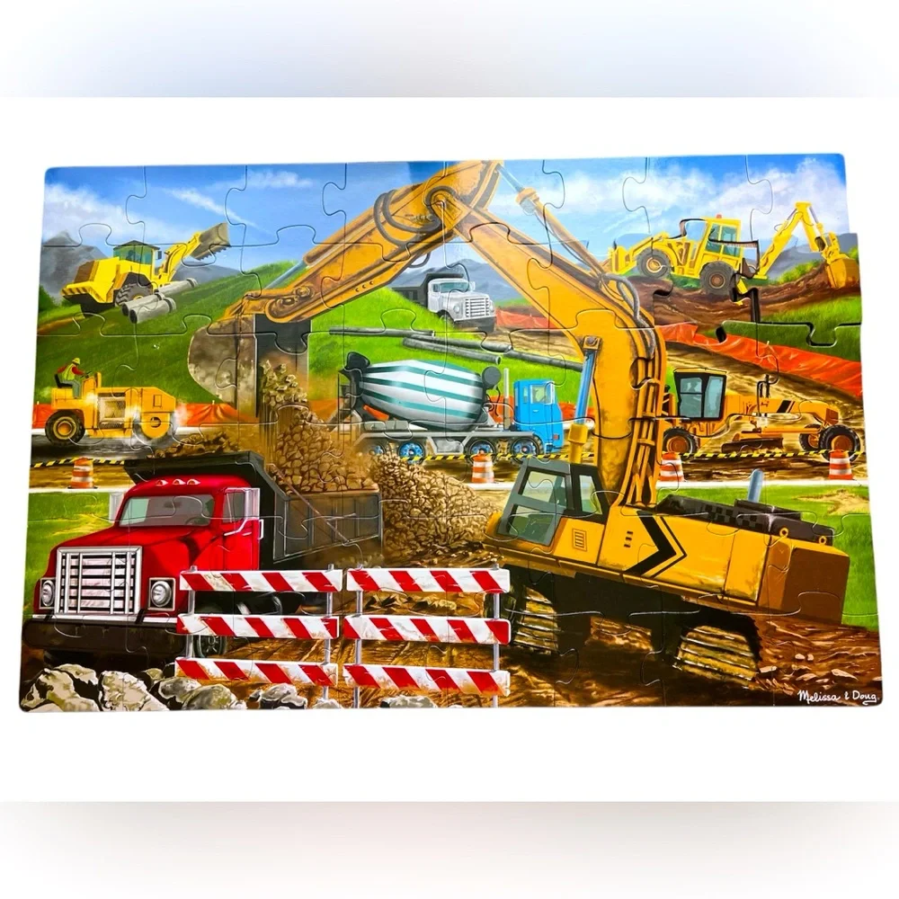 This 48 Piece Construction Site Floor Puzzle is for Ages 4+ by Melissa & Doug.